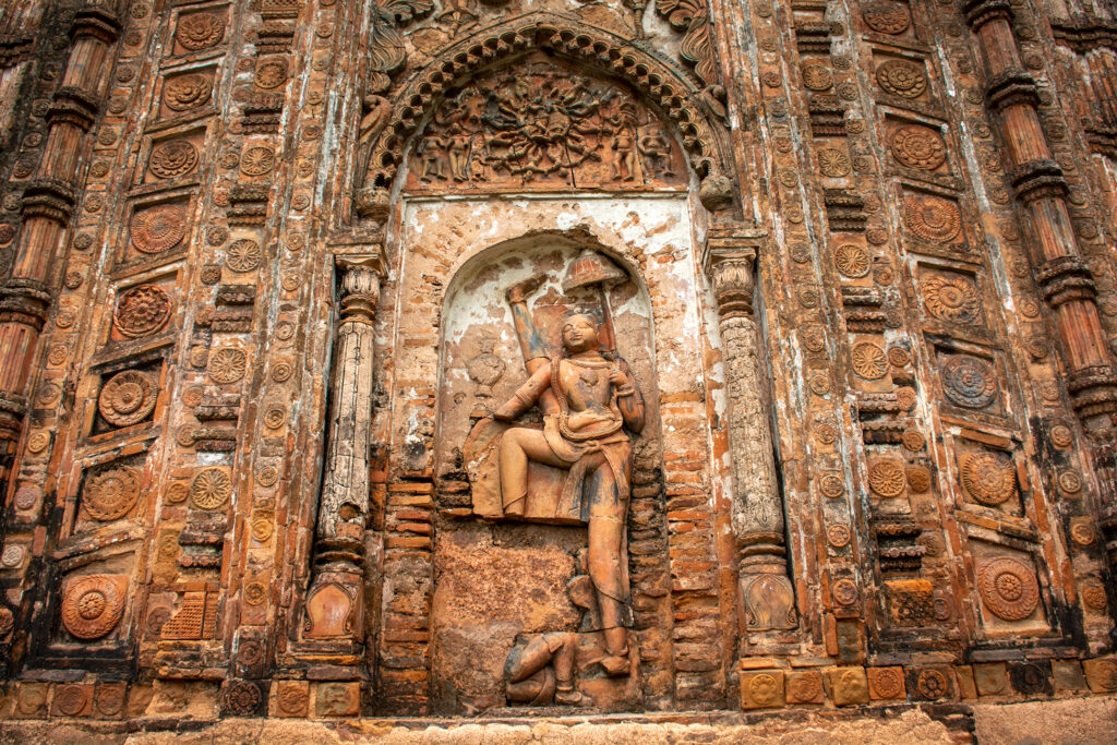 Trivikarma sculpture